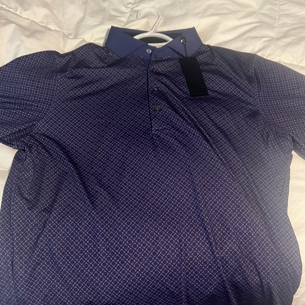 Greyson Polo. large.  new with tags.   left sleeve has golf country club logo .